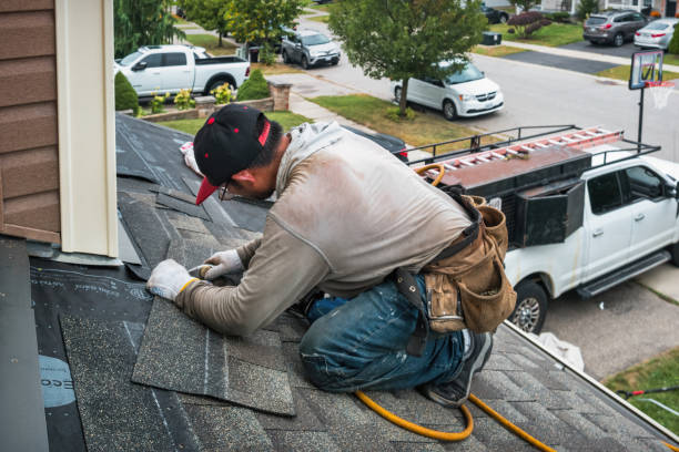 Professional Roofing technician working in Gold Hill, OR